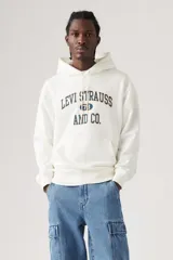 Buzo hoodie color crema de Levi's con estampa frontal de la marca en azul y marrón. Tiene capucha con cordones ajustables y bolsillo tipo canguro. Corte holgado.