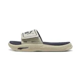 Sandalias Puma Softride Pro Slide 24, color beige con detalles en azul marino. Presentan una tira ancha con el logo de Puma y la tecnología Softride en la plantilla para mayor comodidad.