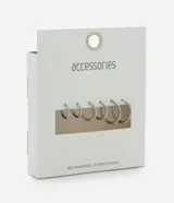 Set de seis aros tipo argolla de acero inoxidable en tonos plateados, con diámetros decrecientes. Son lisos y tienen cierre de bisagra.