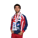 Bufanda de punto tricotada con los colores del Club Nacional de Football, con el escudo del club y el logo de Umbro. Incluye flecos en los extremos.