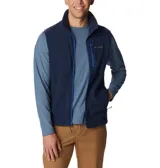 Chaleco de polar Columbia Fast Trek para hombre, color azul marino con cierre y detalles en azul eléctrico. Cuenta con cuello alto, bolsillos laterales con cierre y bolsillo en el pecho con cierre.
