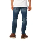 Jeans slim fit color gris, con bolsillos delanteros y traseros, confeccionados en denim con tecnología stretch.