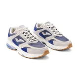 Championes Joma inspirados en el running, color gris con detalles en azul. Capellada de malla transpirable y serraje, con tecnología VTS para ventilación. Mediasuela de phylon con gel PULSOR para amortiguación y STABILIS para estabilidad. Suela de caucho DURABILITY resistente al desgaste.