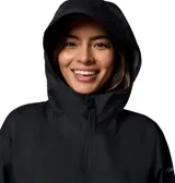 Campera cortaviento color verde claro, con capucha ajustable, cierre frontal con cremallera bidireccional, cintura ajustable con cordón, bolsillos con cremallera y puños ajustables.