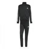 Conjunto deportivo Adidas negro de tricot, compuesto por campera con cierre y pantalón. La campera tiene cuello alto, cierre frontal, bolsillos laterales y las tres franjas blancas características en las mangas. El pantalón tiene cintura elástica con cordón ajustable y las tres franjas blancas en los laterales.