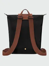 Mochila Longchamp modelo Le Pliage Original M, color crudo con detalles en cuero marrón.