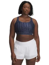 Top deportivo Under Armour con estampado abstracto en tonos de azul y gris. Cuenta con breteles anchos cruzados en la espalda y banda elástica con el logo de la marca.