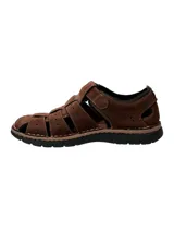 Sandalia de cuero marrón con aberturas y ajuste con velcro.