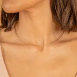 Gargantilla fina de oro amarillo 9k con diseño trenzado.