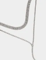 Collar largo plateado con strass, estilo corbatero.