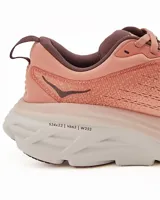 Championes de running color rosa, diseñados para ofrecer máxima amortiguación y comodidad en superficies duras.