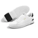Championes Puma Serve Pro de cuero blanco con detalles en gamuza negra en el talón y logo dorado en el lateral.