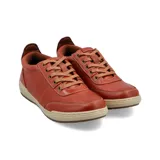 Championes urbanos Hush Puppies modelo Draper, color azul marino, confeccionados en cuero, con cordones grises, plantilla Smart Foam® y suela de goma color beige.