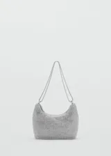Bolso plateado pequeño con apliques de cristales facetados, doble asa de cadena y cierre de cremallera.