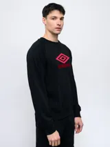 Buzo gris melange de felpa sin frisa, con cuello redondo y logo de Umbro bordado en azul marino en el pecho.