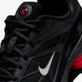 Championes Nike Shox Ride 2, color negro con detalles en rojo vibrante en la amortiguación Shox. Presenta capellada de malla y sintético, con el logo Swoosh en blanco.