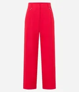 Pantalón de vestir negro de corte wide leg, con cintura alta y doble cintura con detalle de remaches.