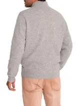 Sweater celeste de punto con cuello alto y cierre frontal completo.