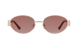 Lentes de sol Celine modelo Donna 1262, con montura ovalada dorada y lentes rosadas. Las patillas son de color marrón carey.