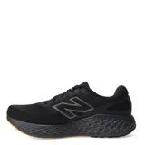 Championes de running New Balance Evoz V4, color negro con suela color caramelo.