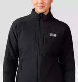Campera negra de mujer, con cierre frontal, cuello alto y logo de la marca en el pecho.