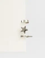 Set de bijou cuff plateados con forma de aro, estrella y llave.