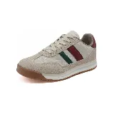 Championes Panama Jack color beige con detalles en verde y bordó.