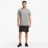Short deportivo Puma Performance Woven 7" de hombre, color negro con logo estampado en gris.