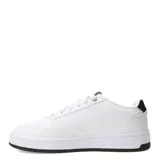 Championes Puma Court Classic negros de cuero sintético, con detalles dorados en el logo y cordones negros.