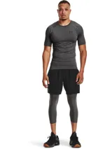 Remera deportiva Under Armour HeatGear Armour de manga corta, color blanco, con logo negro en el pecho.