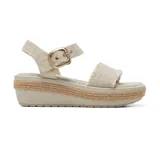 Sandalias de plataforma color beige con detalle de yute en la plataforma y hebilla dorada.