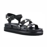 Sandalias negras con plataforma y tiras con apliques de tachas piramidales plateadas.