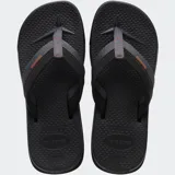 Ojotas Havaianas Track Plus color negro con tiras de tela gris y detalles en naranja.