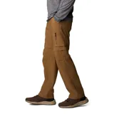 Pantalón de senderismo convertible en short, color negro, con tecnología Omni-Shade™ de protección solar UPF 50 y Omni-Wick™ de secado rápido. Cuenta con cintura parcialmente elástica, cinturón extraíble, bolsillos para manos, bolsillo de seguridad con cremallera, bolsillo cargo con cierre de velcro y detalle de fuelle.