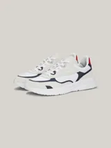 Zapatillas Tommy Hilfiger de running en ante color blanco, azul y rojo, con ribetes en zigzag y paneles color block.