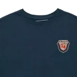 Remera azul marino de corte recto y manga corta, con un escudo estampado en el pecho y el logo de Caterpillar en la parte inferior.