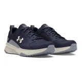 Championes Under Armour Charged Edge para hombre, color negro con detalles en verde flúor y suela blanca. Ideales para entrenamiento en gimnasio o al aire libre.