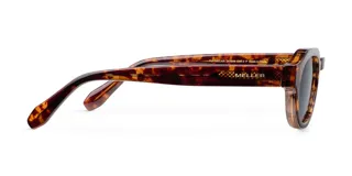 Gafas de sol unisex con montura carey geométrica, lentes polarizadas negras con protección UV400, varillas sobresalientes y diseño retro-chic.