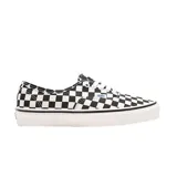 Zapatillas tipo sneakers de lona con estampado de cuadros en blanco y negro.