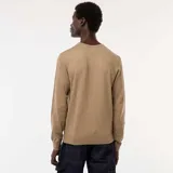 Sweater marrón claro de punto liso, con cuello en V y mangas largas.