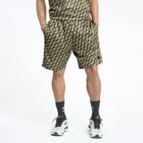 Short deportivo Umbro con estampado geométrico en tonos negro y dorado.