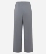 Pantalón largo de rib color crudo, con cintura elástica y cordón de ajuste.