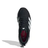 Championes Adidas negros con detalles plateados y suela blanca.
