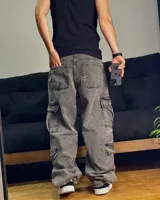 Pantalón cargo gris con efecto gastado, de tela denim y corte mega baggy.