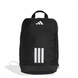Bolsa para calzado deportiva Adidas Tiro Shoebag, color negro, con logo de la marca y tres franjas verticales blancas en el frente. Posee un asa superior para transporte y un compartimento inferior con cierre.