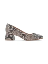 Zapato de mujer de punta cuadrada con tacón intermedio forrado, diseñado para complementar outfits elegantes tanto de día como de noche.