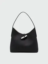 Bolso de hombro Longchamp modelo Roseau, color negro, confeccionado en cuero con cierre de broche metálico plateado.