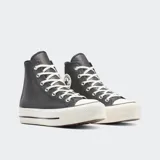 Championes Converse Chuck Taylor All Star Lift Platform, color gris con detalles metalizados, plataforma blanca y cordones blancos.