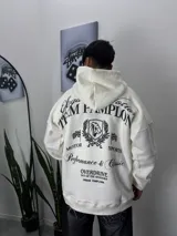 Buzo blanco de algodón con capucha y estampado en la espalda con el texto "TEAM PAMPLON" y un escudo con un caballo.