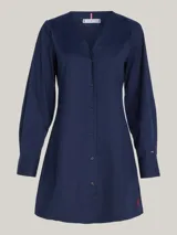 Vestido camisero azul marino de corte evasé, con cuello en V, manga larga y cierre frontal con botones.